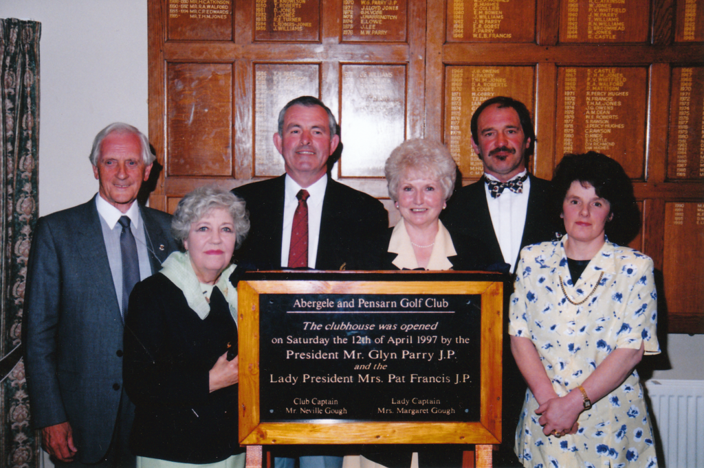 Official opening of the new clubhouse on 12th April 1997. Pictured are Club Presidents' (W.Glyn Parry, Pat Francis) Captains' (Margaret and Nev Gough) and Mr and Mrs Gizzi.